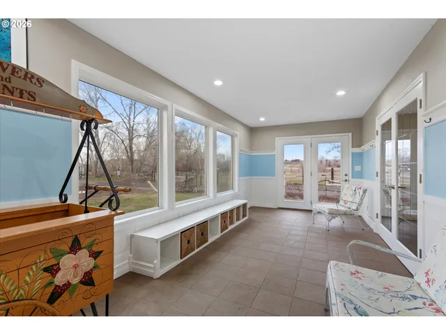 a large white room with a large window