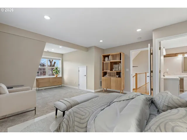 a bedroom with a bed and furniture