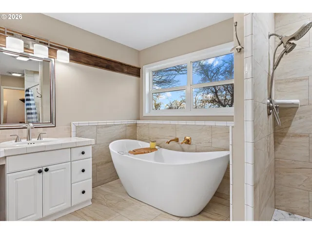 a bathroom with a sink and a bathtub
