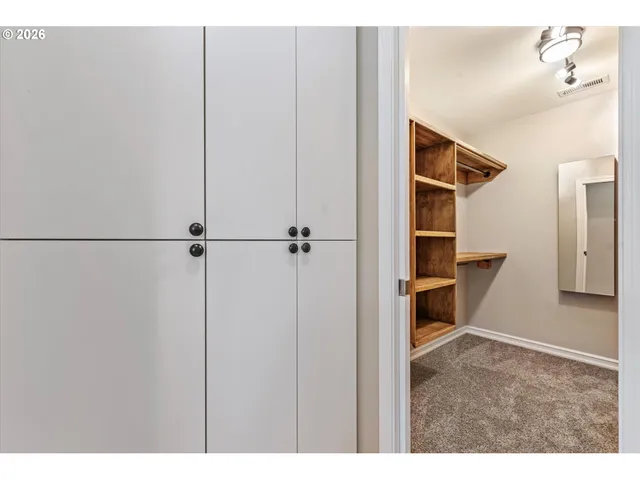 a view of a kitchen from the hallway