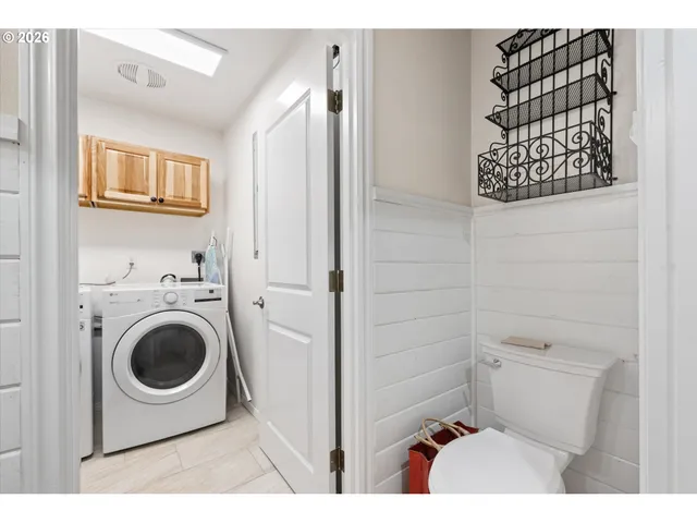 a bathroom with a toilet and a sink
