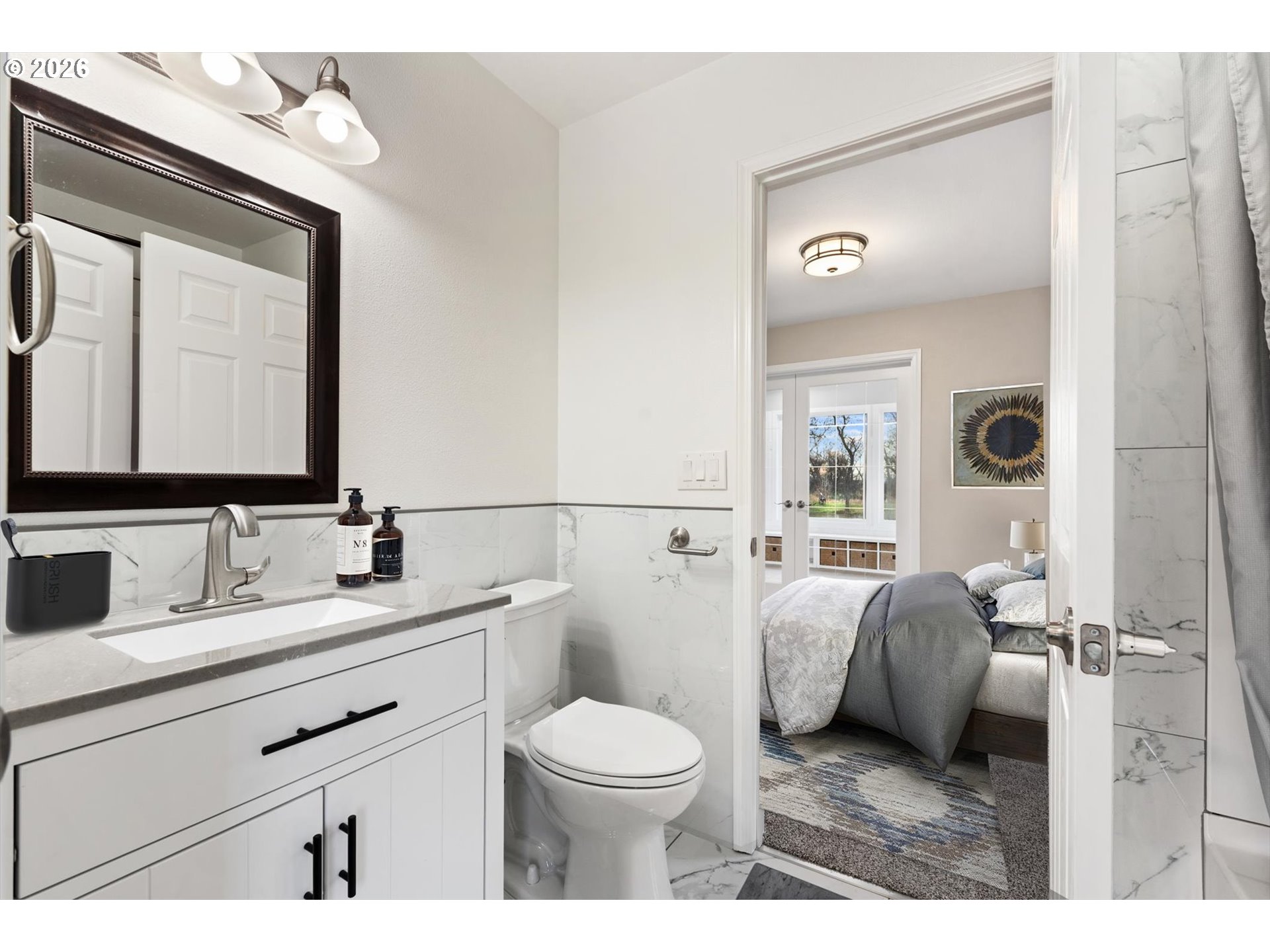10 West Sprague Echo, OR 97826 - Photo 10 of 45 a bathroom with a toilet a sink and a mirror