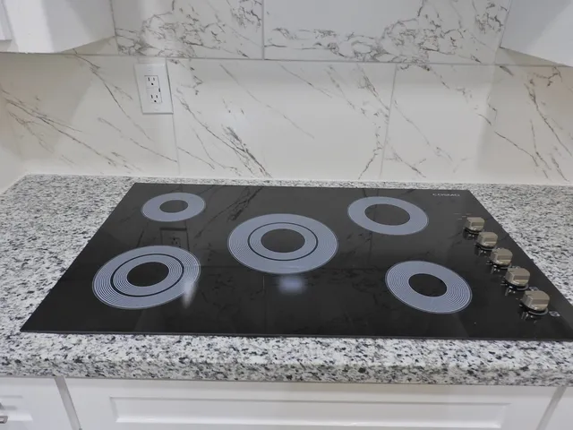 a wooden floor has a stove