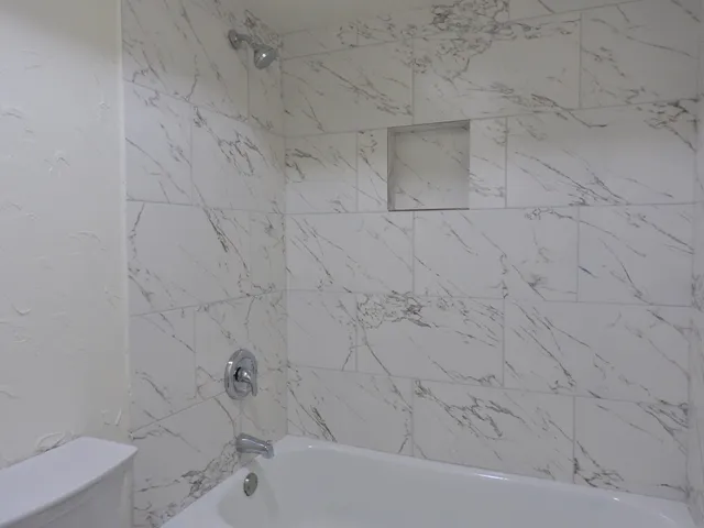 a bathroom with a bathtub