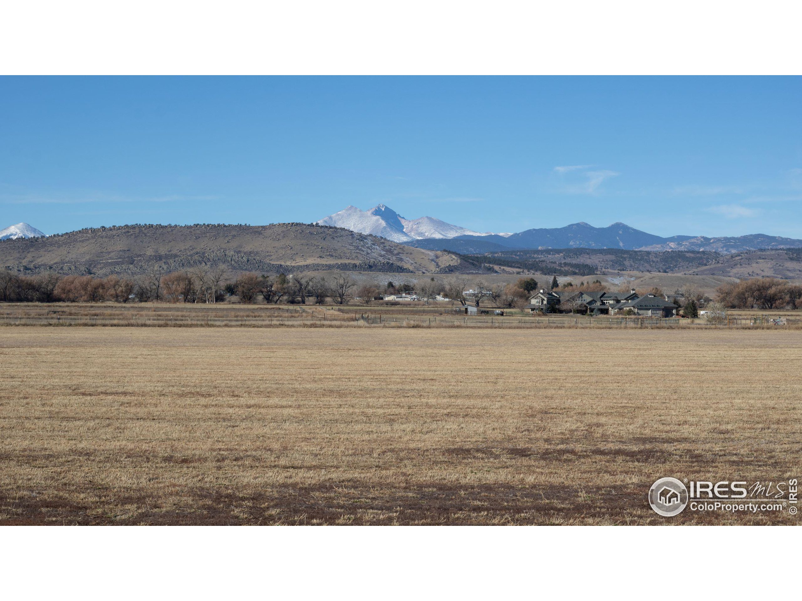 9025 Woodland Road Longmont, CO 80503 - Photo 1 of 3 a view of ocean with mountain