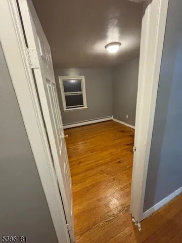 a view of empty room with front door