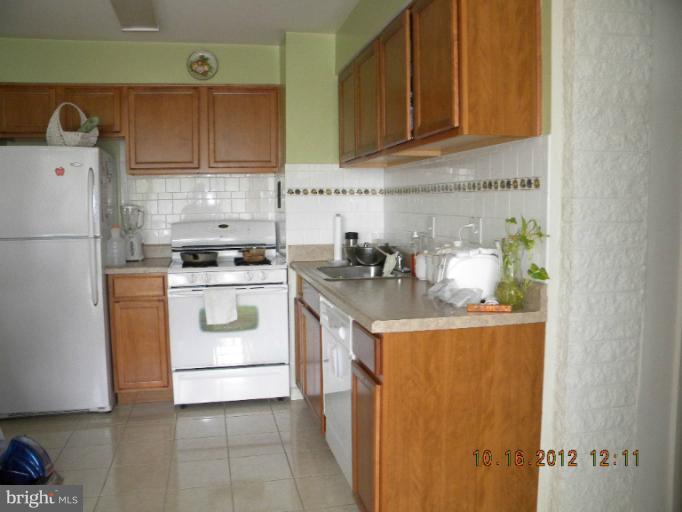 1824 Metzerott Road, Unit 402 Hyattsville, MD 20783 - Photo 11 of 28 Kitchen
