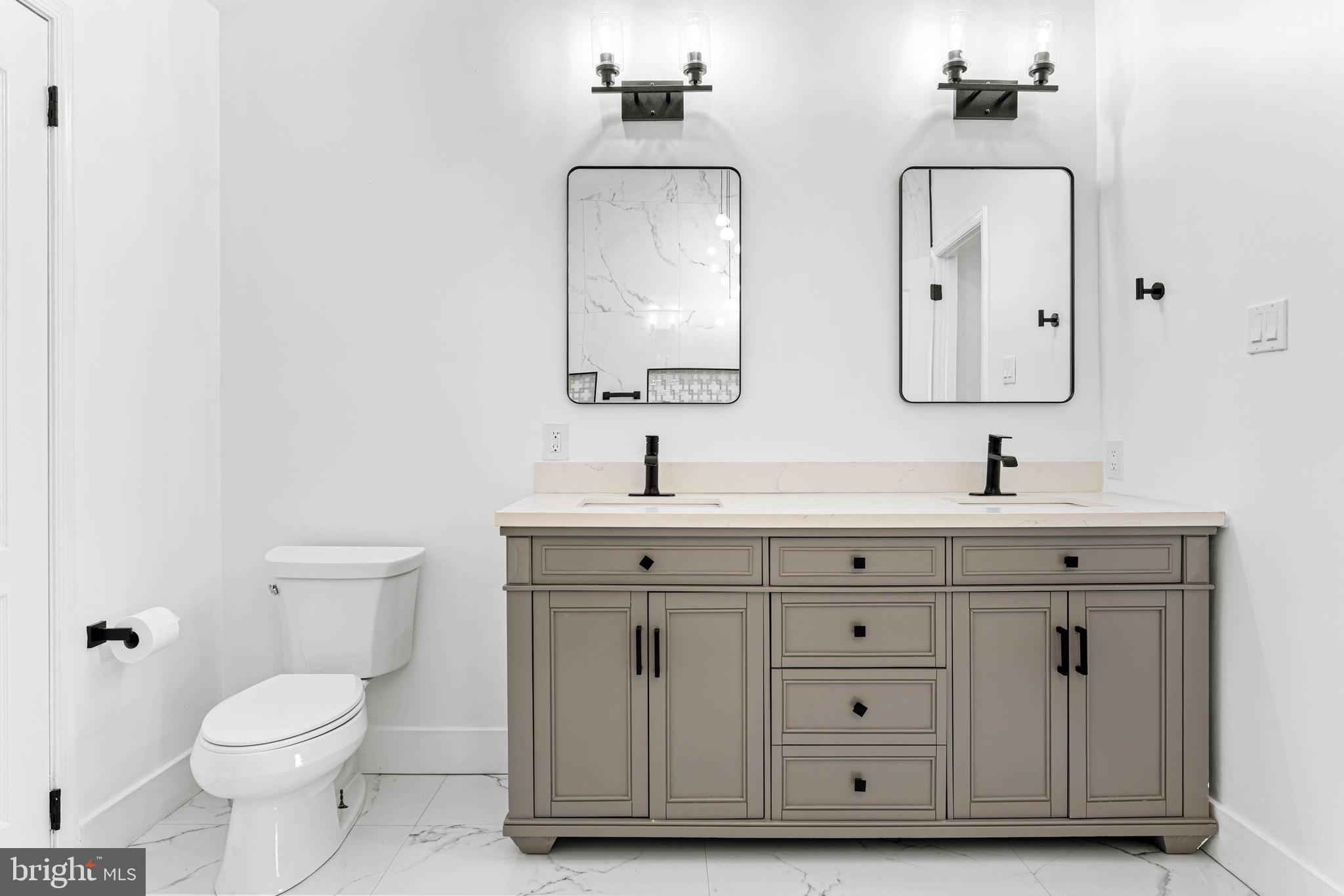 149 Timothy Circle Wayne, PA 19087 - Photo 23 of 37 Double vanity w/ built in outlets for hair tools.