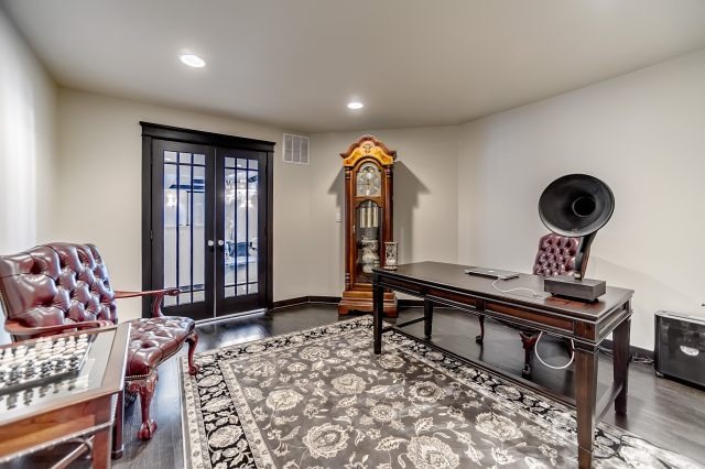 2S611 Arboretum Road Glen Ellyn, IL 60137 - Photo 11 of 25 a living room with furniture a rug and a window