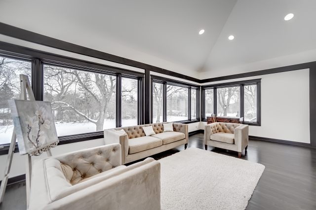 2S611 Arboretum Road Glen Ellyn, IL 60137 - Photo 13 of 25 a living room with furniture and floor to ceiling windows