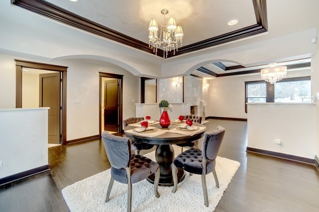 2S611 Arboretum Road Glen Ellyn, IL 60137 - Photo 16 of 25 a view of a dining room with furniture and chandelier