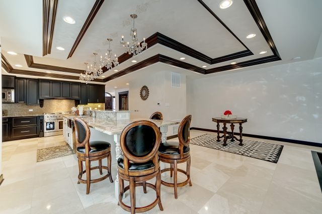2S611 Arboretum Road Glen Ellyn, IL 60137 - Photo 4 of 25 a view of a room with furniture and a chandelier