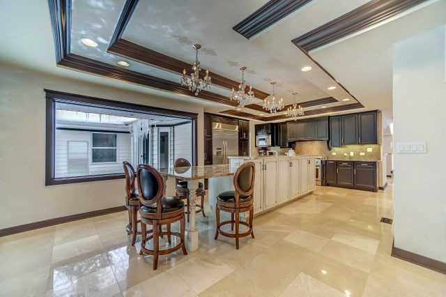 2S611 Arboretum Road Glen Ellyn, IL 60137 - Photo 5 of 25 a utility room with lots of chairs and mirrors