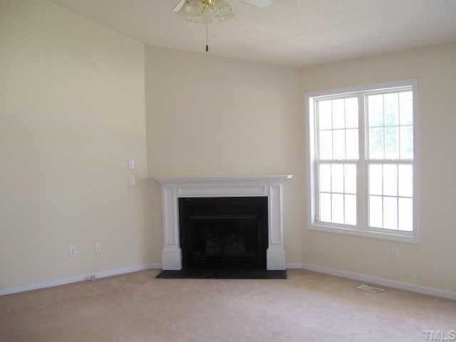 1530 Cleveland Road Smithfield, NC 27577 - Photo 2 of 10 You won't believe the size of this livingroom! It is SPACIOUS with a VAULTED ceiling and a CORNER G/L fireplace!