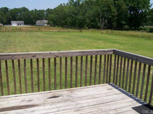 1530 Cleveland Road Smithfield, NC 27577 - Photo 7 of 10 This is a view of the DECK from the back door! This would be a GREAT place to BAR-B-QUE and watch the children play in the yard!