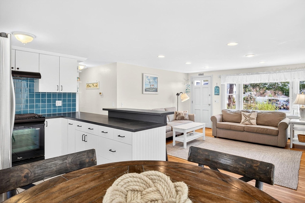 31 Easy Street Dennis, MA 02639 - Photo 12 of 41 a living room with furniture and a large window