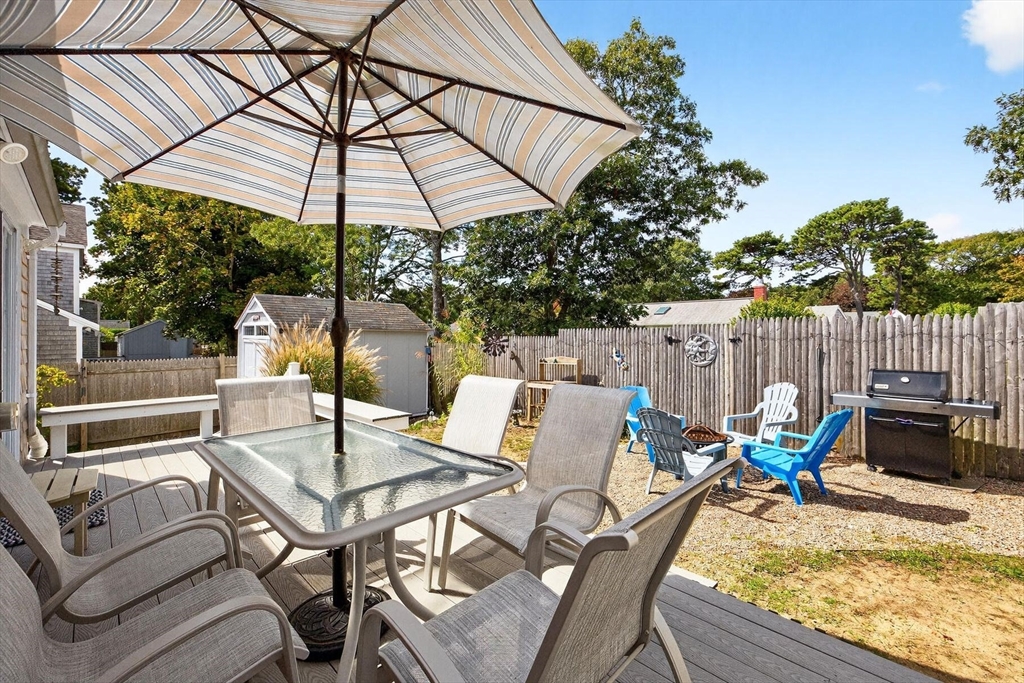31 Easy Street Dennis, MA 02639 - Photo 29 of 41 a view of an outdoor sitting area with furniture
