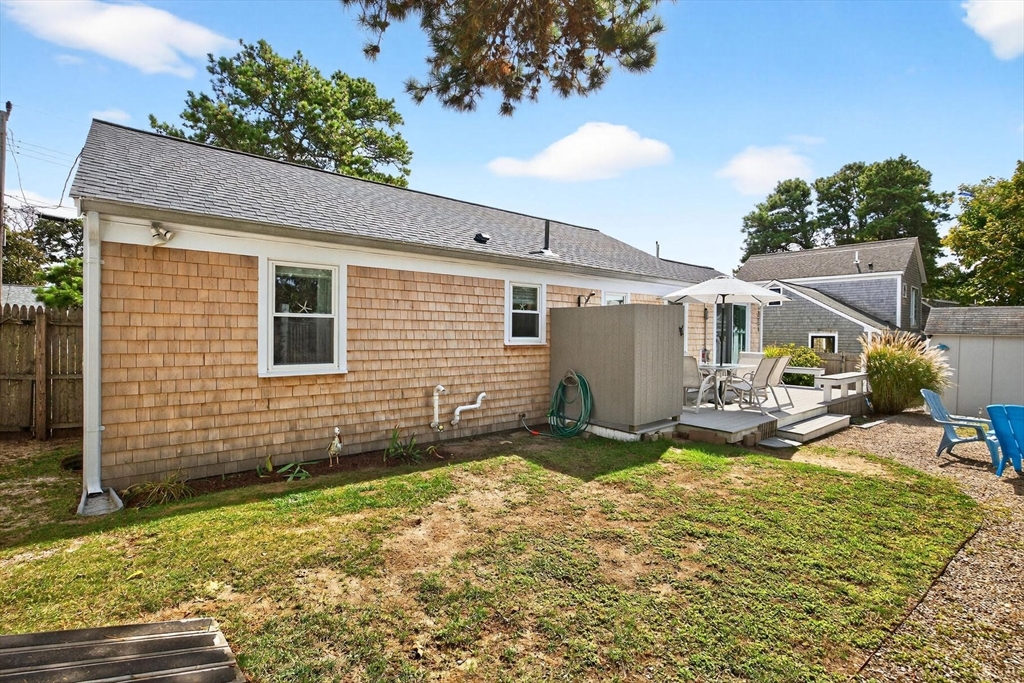 31 Easy Street Dennis, MA 02639 - Photo 32 of 41 a view of a house with backyard and sitting area