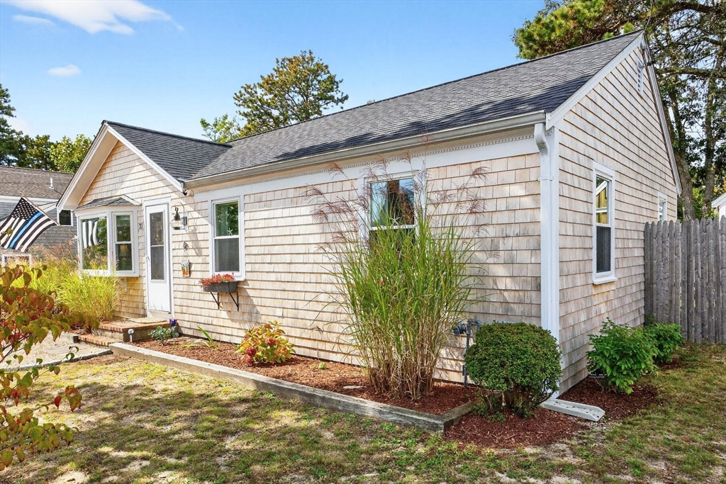 31 Easy Street Dennis, MA 02639 - Photo 38 of 41 a view of a house with backyard