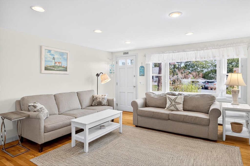 31 Easy Street Dennis, MA 02639 - Photo 5 of 41 a living room with furniture and a large window