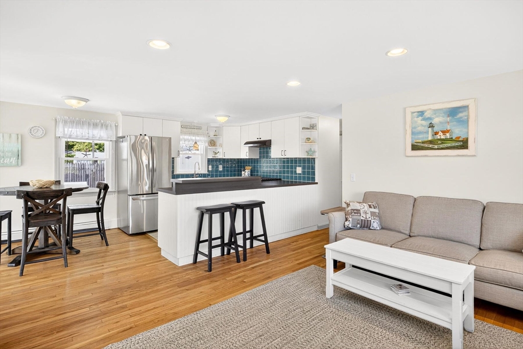 31 Easy Street Dennis, MA 02639 - Photo 7 of 41 a living room with stainless steel appliances furniture and a kitchen view