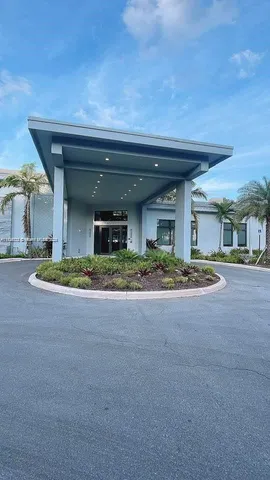 a view of a street with a house