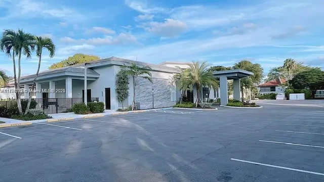 a outdoor space with lots of furniture and view of living room