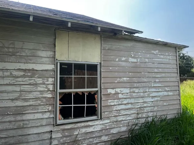 a front view of a house with a window