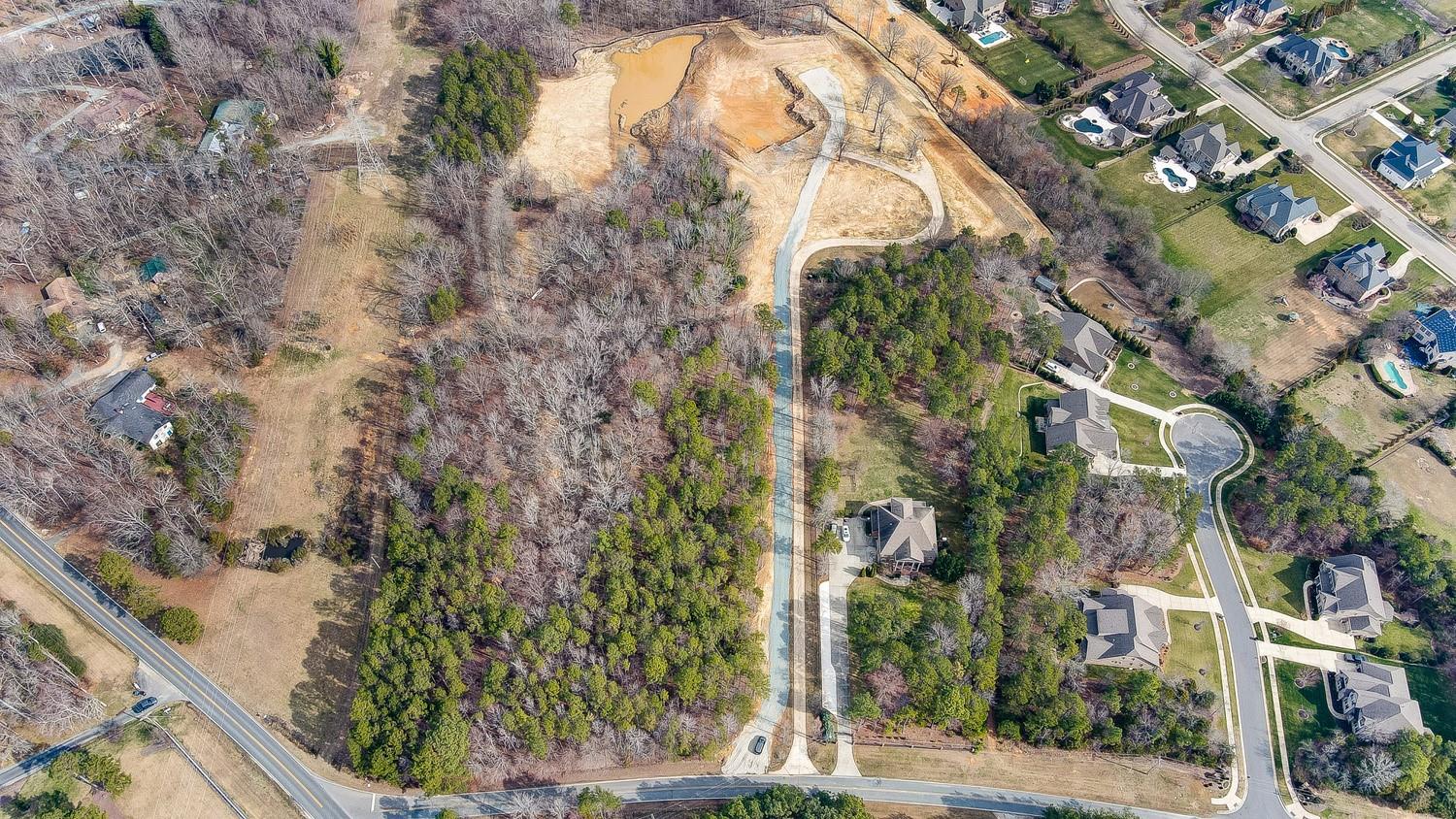 133 Underwood Road Wesley Chapel, NC 28104 - Photo 2 of 10 a street view with tall buildings