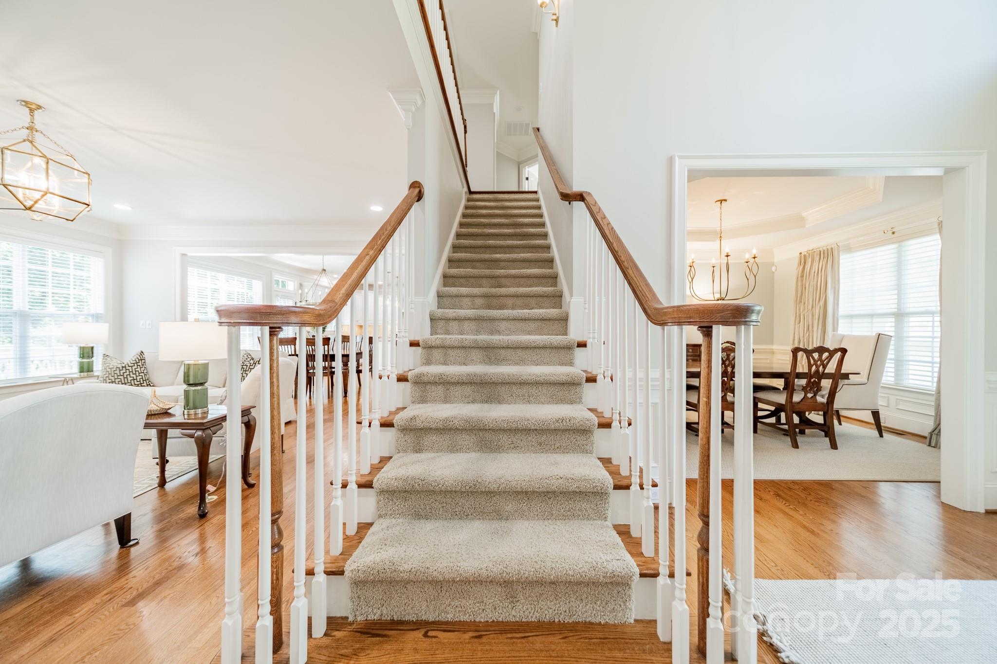 788 Portpatrick Place Fort Mill, SC 29708 - Photo 19 of 48 a view of entryway and hall with wooden floor