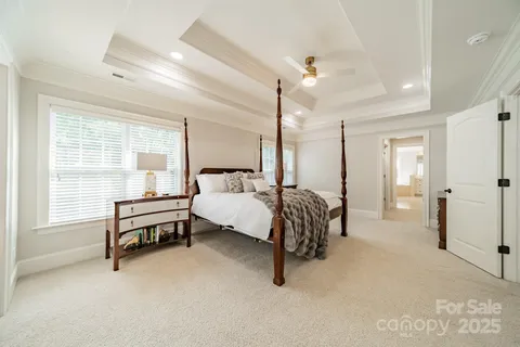 a bedroom with furniture and a bed