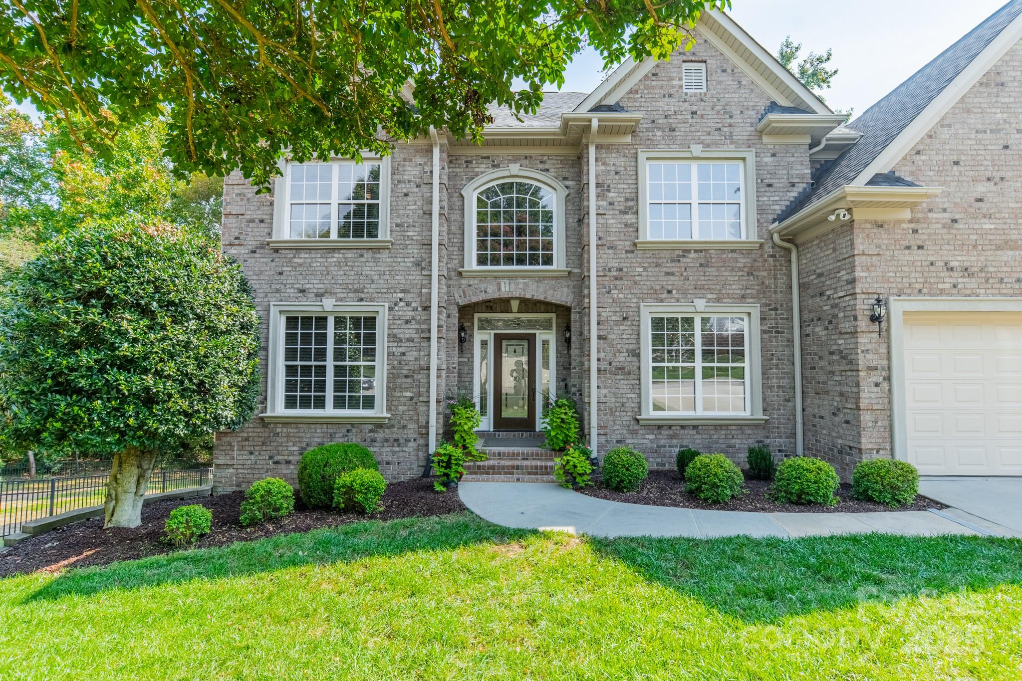 788 Portpatrick Place Fort Mill, SC 29708 - Photo 3 of 48 a front view of a house with garden