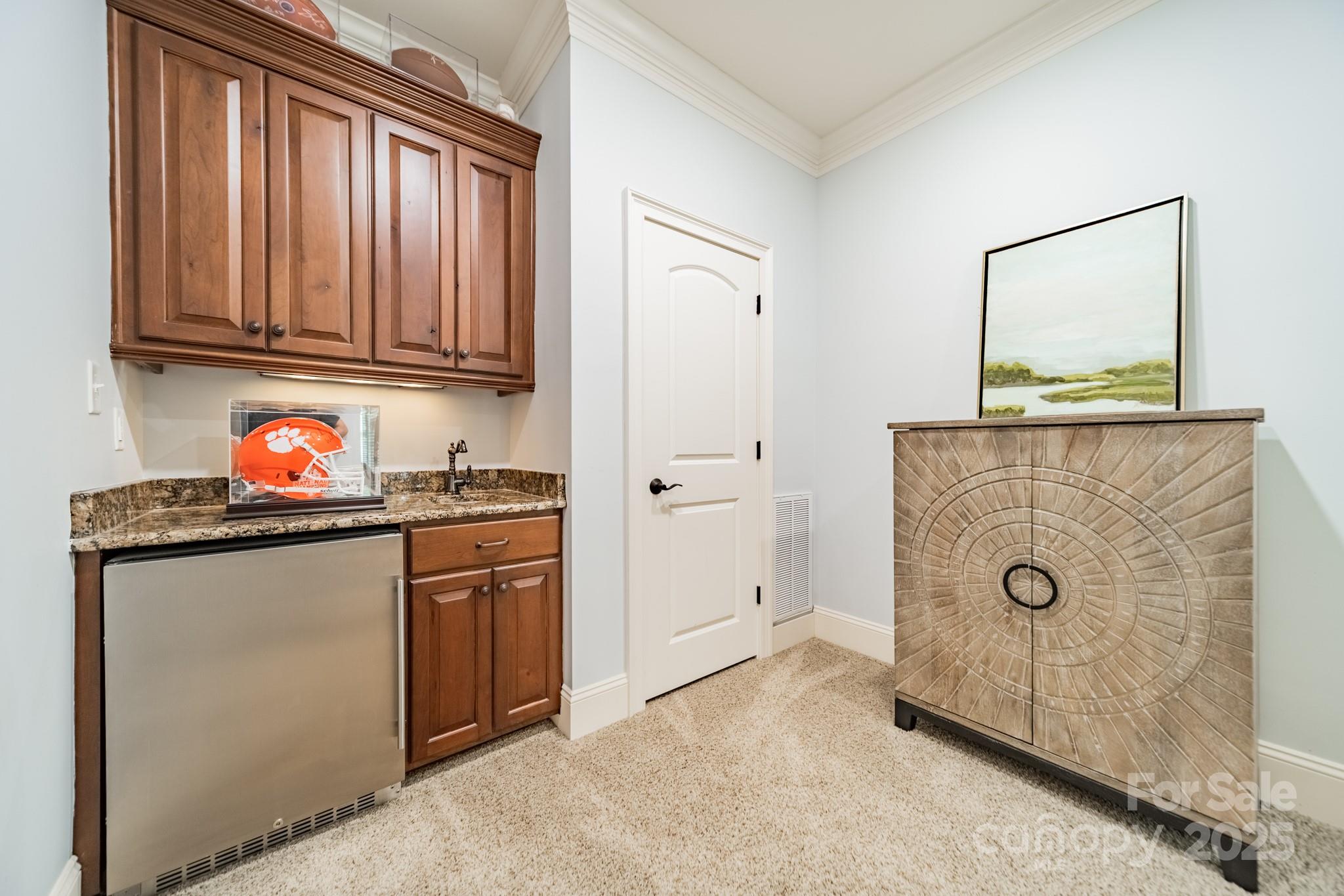 788 Portpatrick Place Fort Mill, SC 29708 - Photo 38 of 48 a kitchen with stainless steel appliances granite countertop a refrigerator and a stove top oven