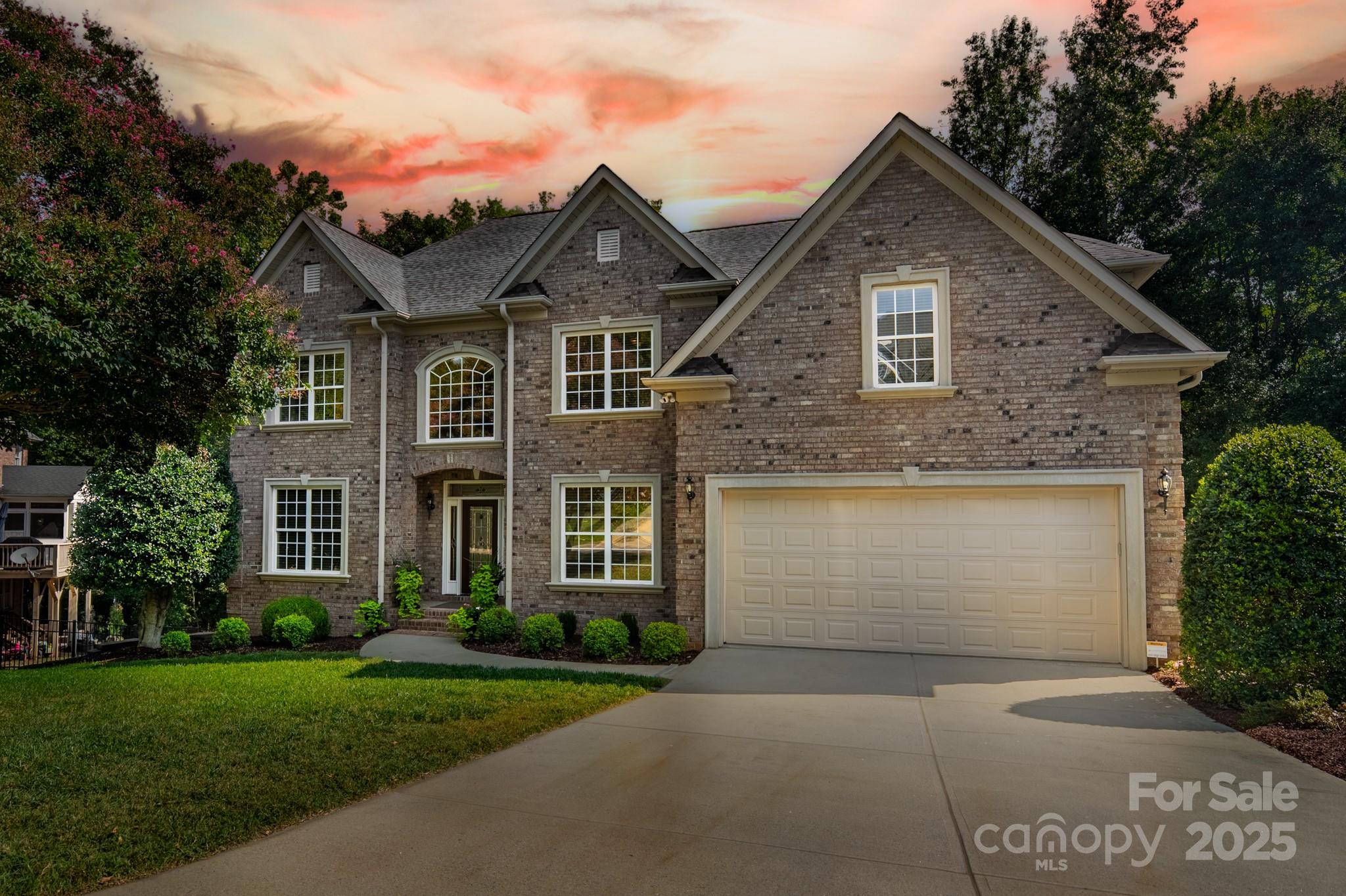 788 Portpatrick Place Fort Mill, SC 29708 - Photo 4 of 48 a front view of a house with a yard and garage