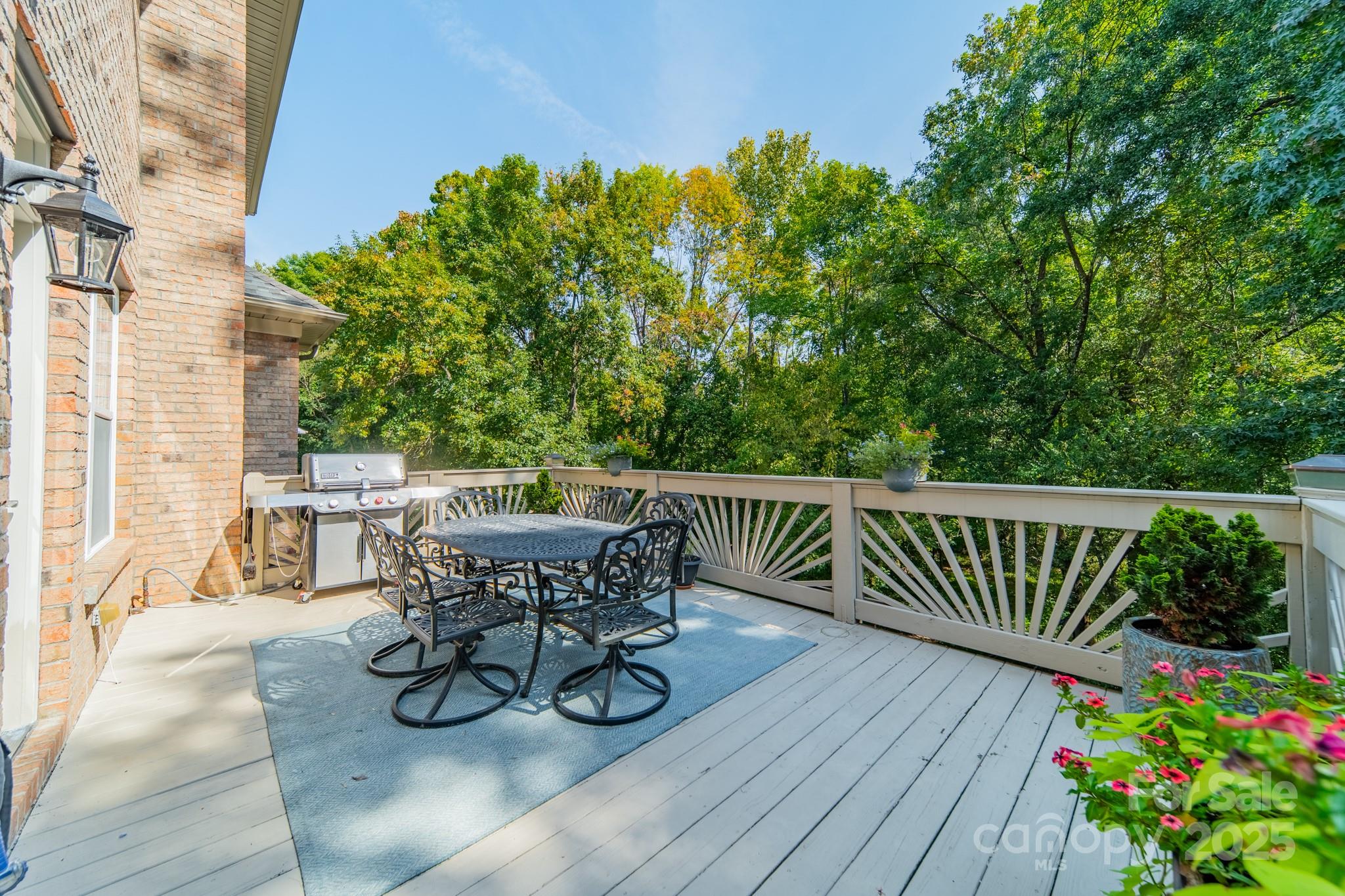 788 Portpatrick Place Fort Mill, SC 29708 - Photo 42 of 48 a view of a table and chairs on the roof deck