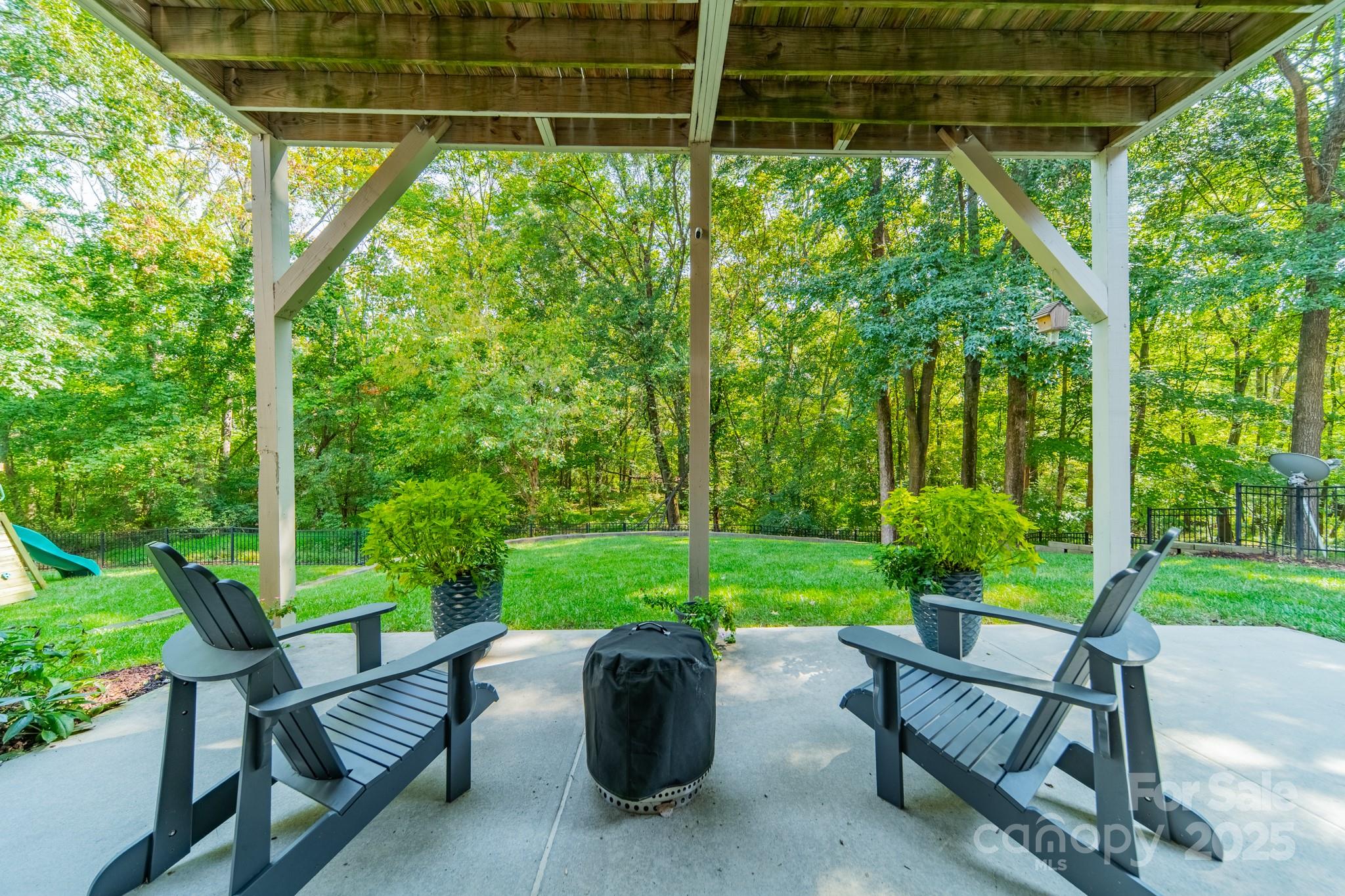 788 Portpatrick Place Fort Mill, SC 29708 - Photo 43 of 48 a view of backyard with seating space and green space