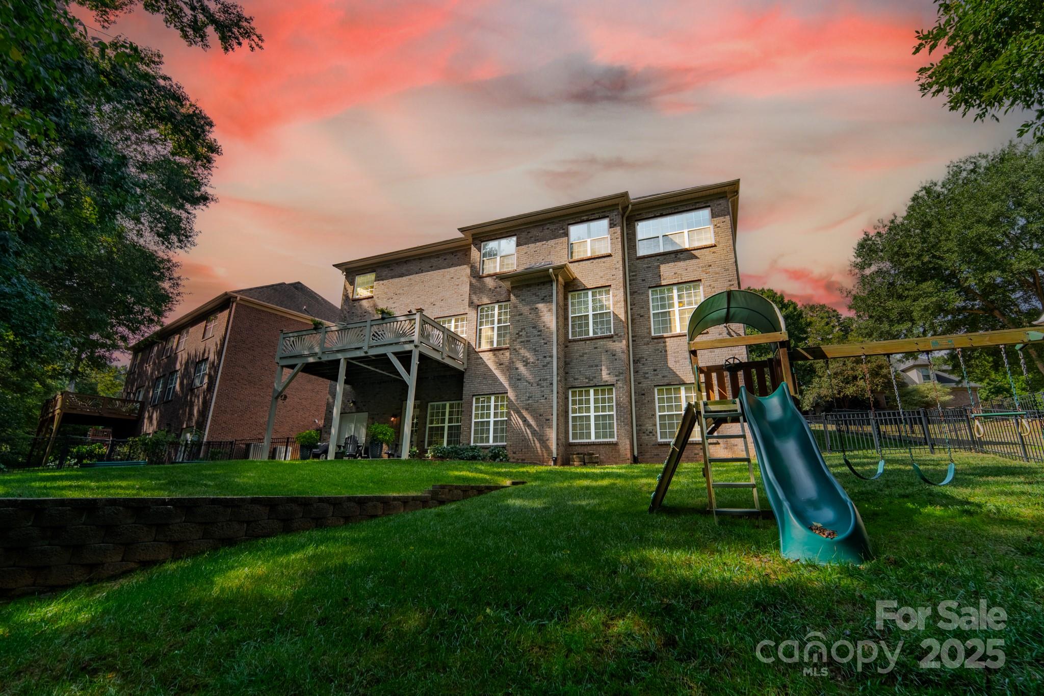 788 Portpatrick Place Fort Mill, SC 29708 - Photo 45 of 48 a front view of a house with garden and a slide
