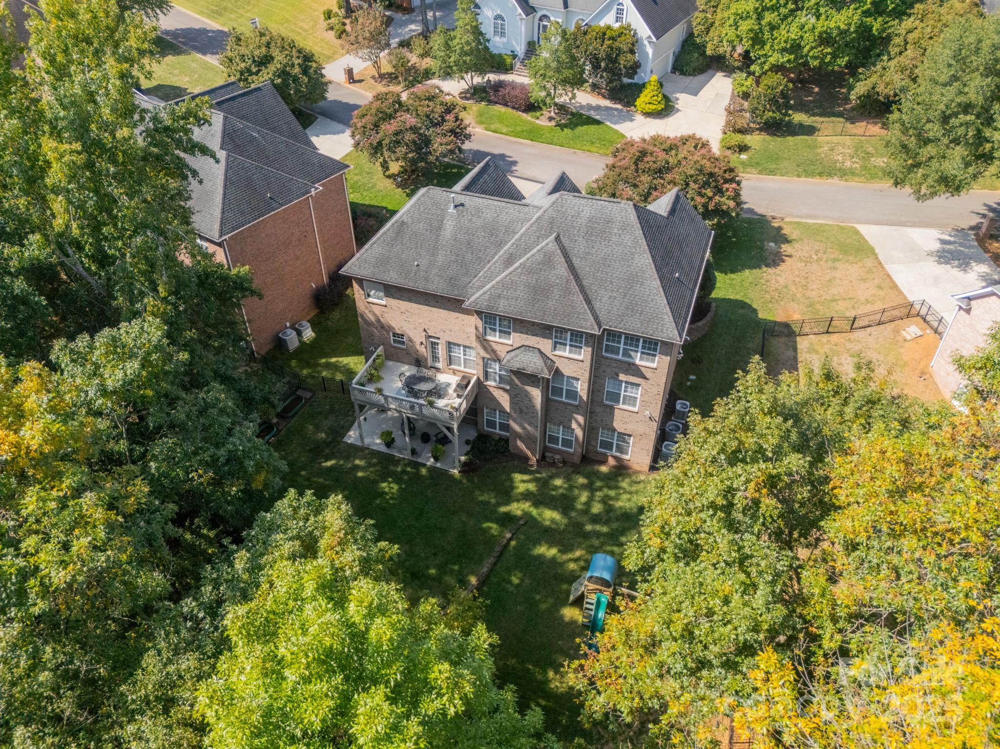788 Portpatrick Place Fort Mill, SC 29708 - Photo 47 of 48 an aerial view of a house with swimming pool and garden