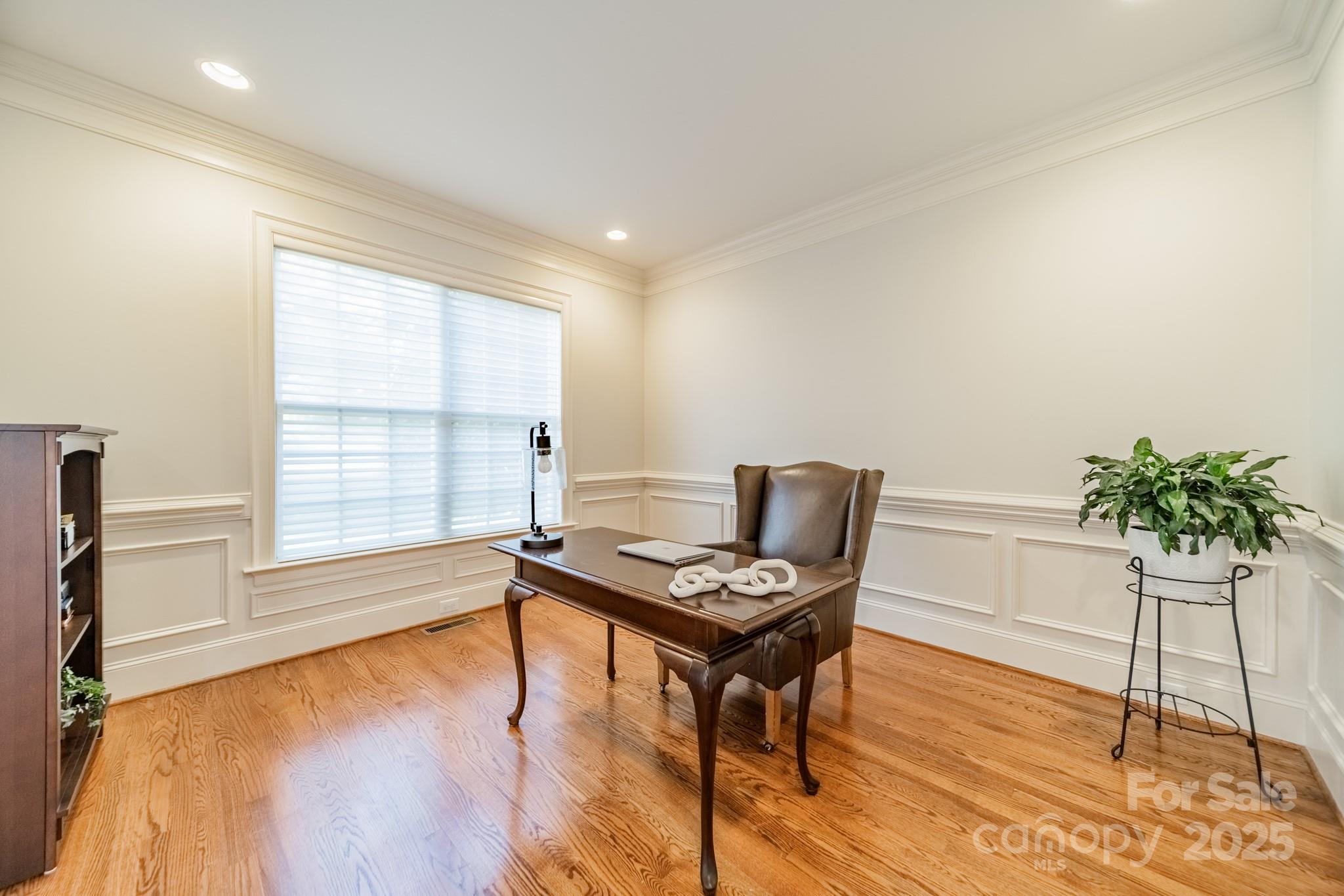 788 Portpatrick Place Fort Mill, SC 29708 - Photo 6 of 48 a view of a workspace with furniture and a potted plant