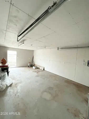 a backyard of a house with wooden fence