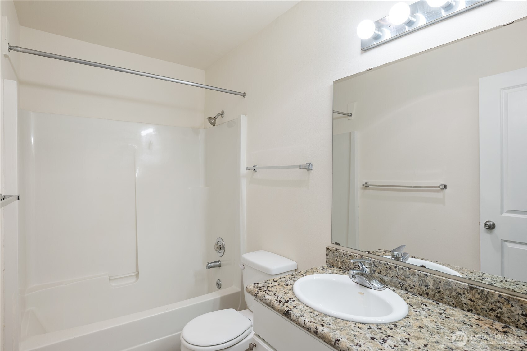 802 North 43rd Street Seattle, WA 98103 - Photo 10 of 18 a bathroom with a sink toilet and shower