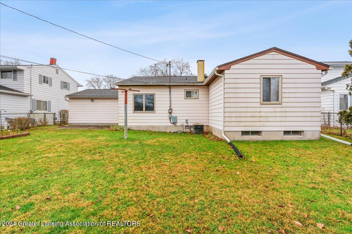 4130 Rivershell Lane Lansing, MI 48911 - Photo 25 of 31 Back yard, fully fenced