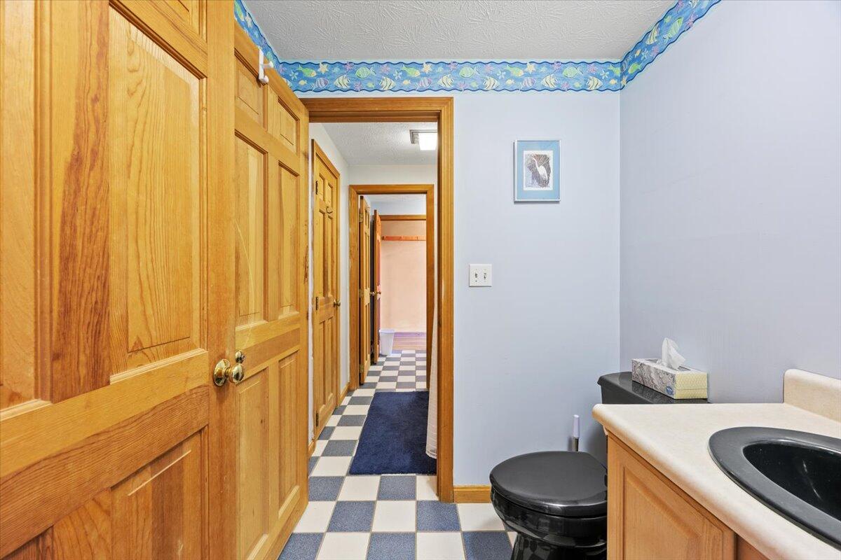 545 Foss Road Limerick, ME 04048 - Photo 25 of 53 Bathroom with Hallway