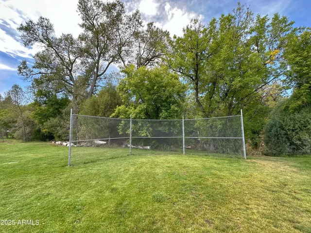 a backyard of a house with lots of green space