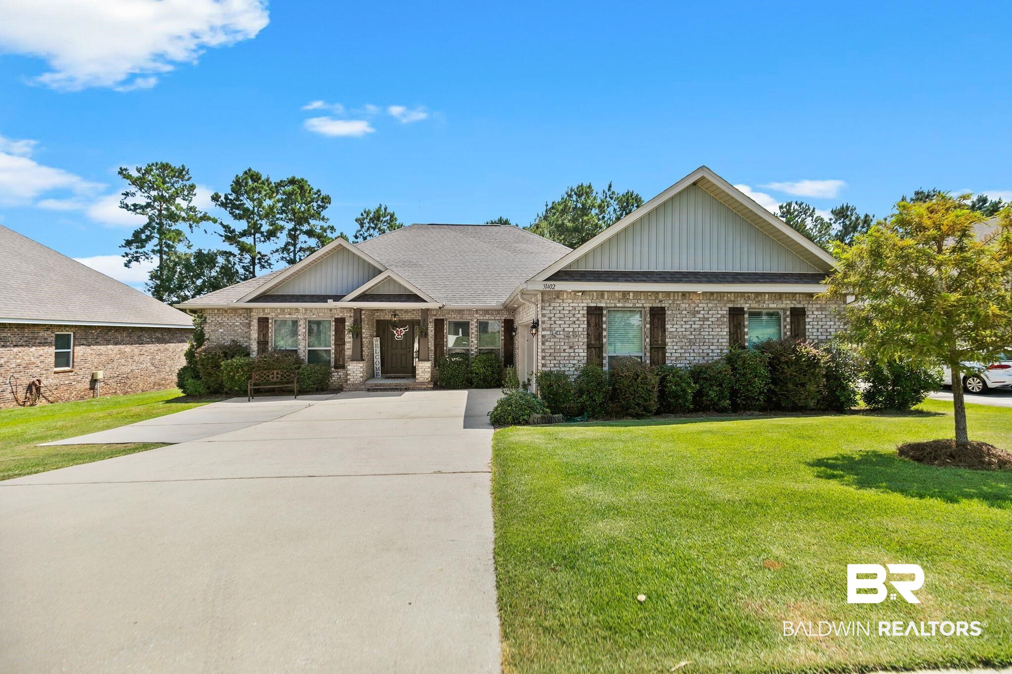 31402 Hoot Owl Road Daphne, AL 36527 - Photo 1 of 43 Craftsman inspired home with a front lawn