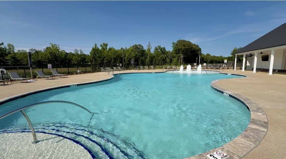 1000 Mewborn Farm Road Oakland, TN 38060 - Photo 21 of 26 a view of a swimming pool with a patio
