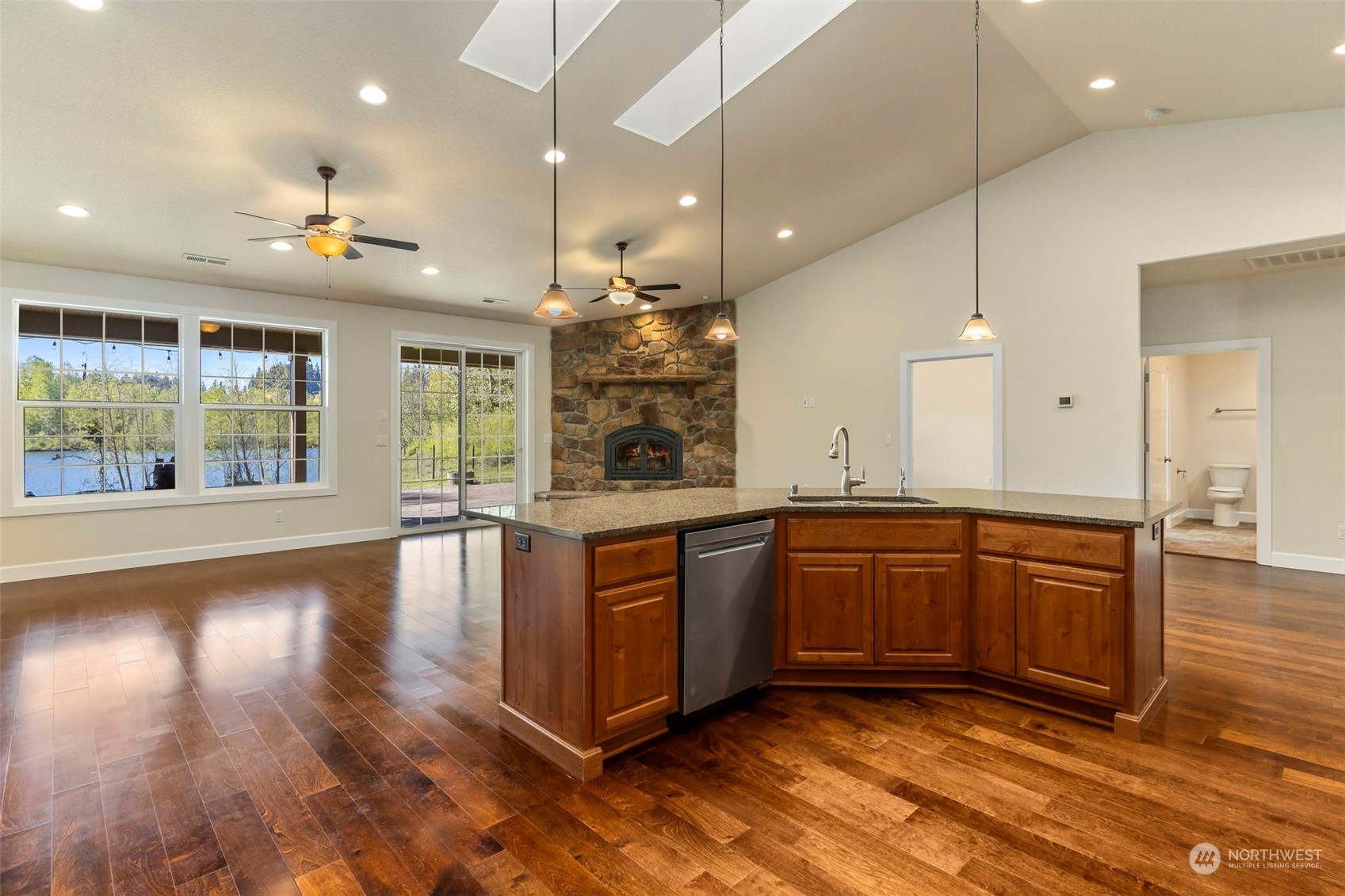 191 Collins Road Toledo, WA 98591 - Photo 5 of 40 a large kitchen with kitchen island a large island in it