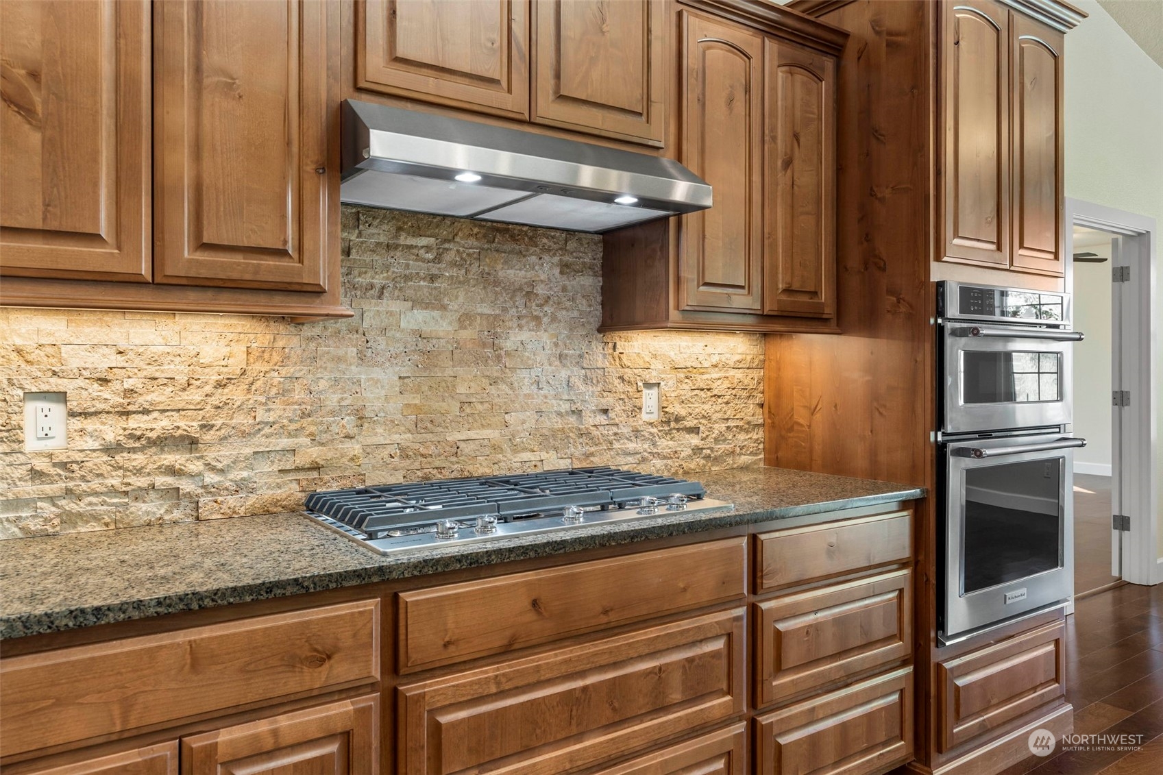 191 Collins Road Toledo, WA 98591 - Photo 10 of 40 a kitchen with granite countertop stainless steel appliances and cabinets