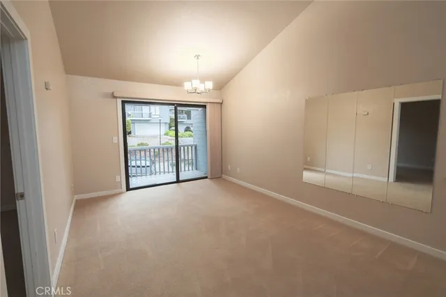 a view of a balcony with wooden floor