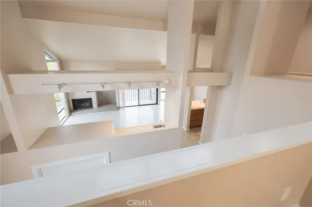 an empty room with sliding glass door